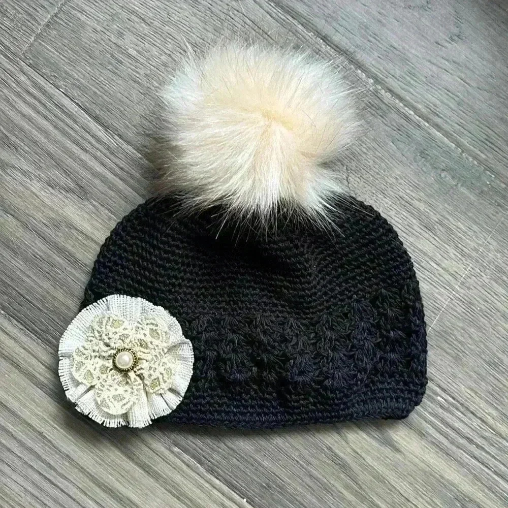 Hand crafted black crochet girls hat with flower and fuzzy pom pom - Picture 1 of 9